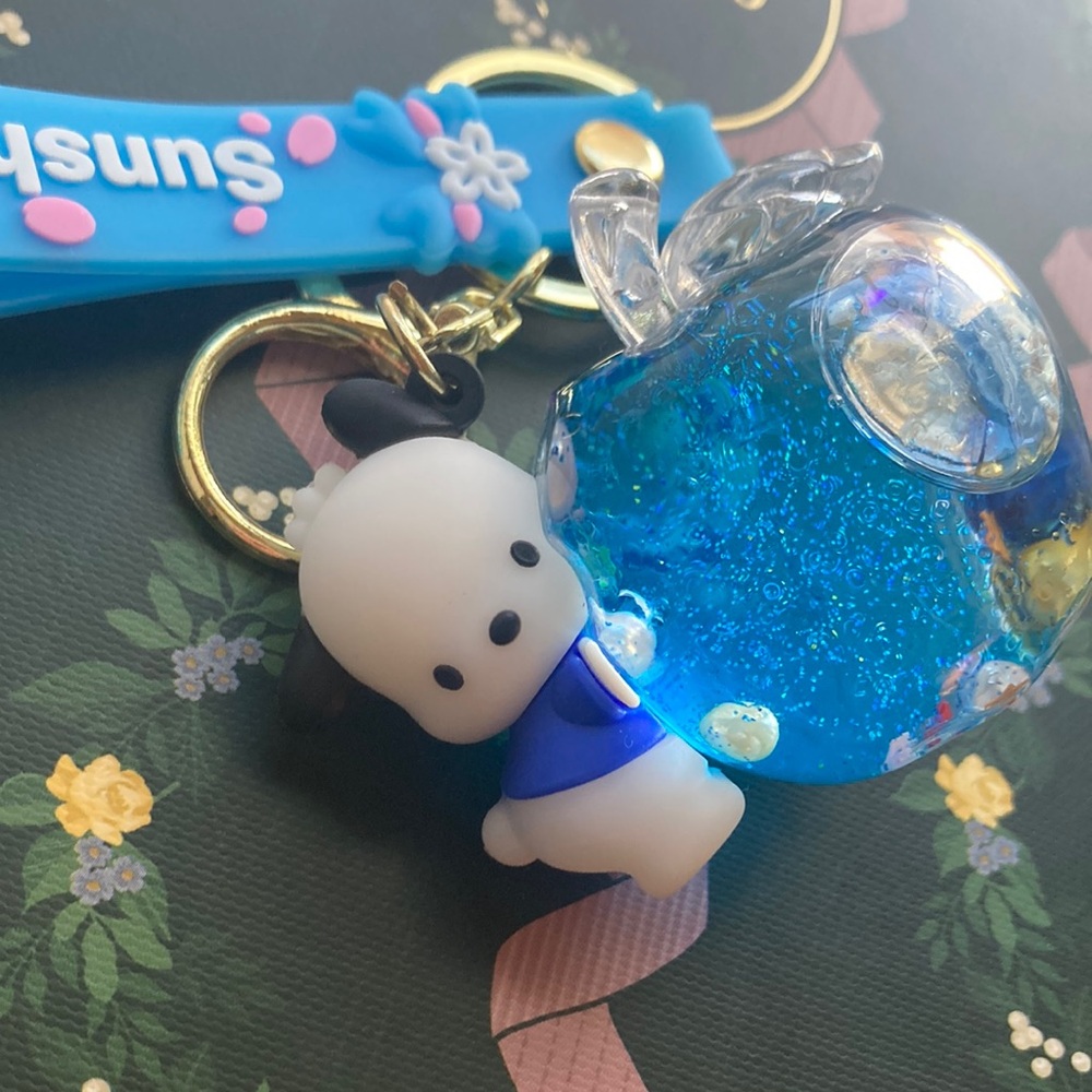 Pochacco holding glitter filled Apple Keychain